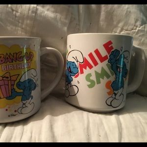 Bundle lot of 2 smurf vintage coffee mugs.